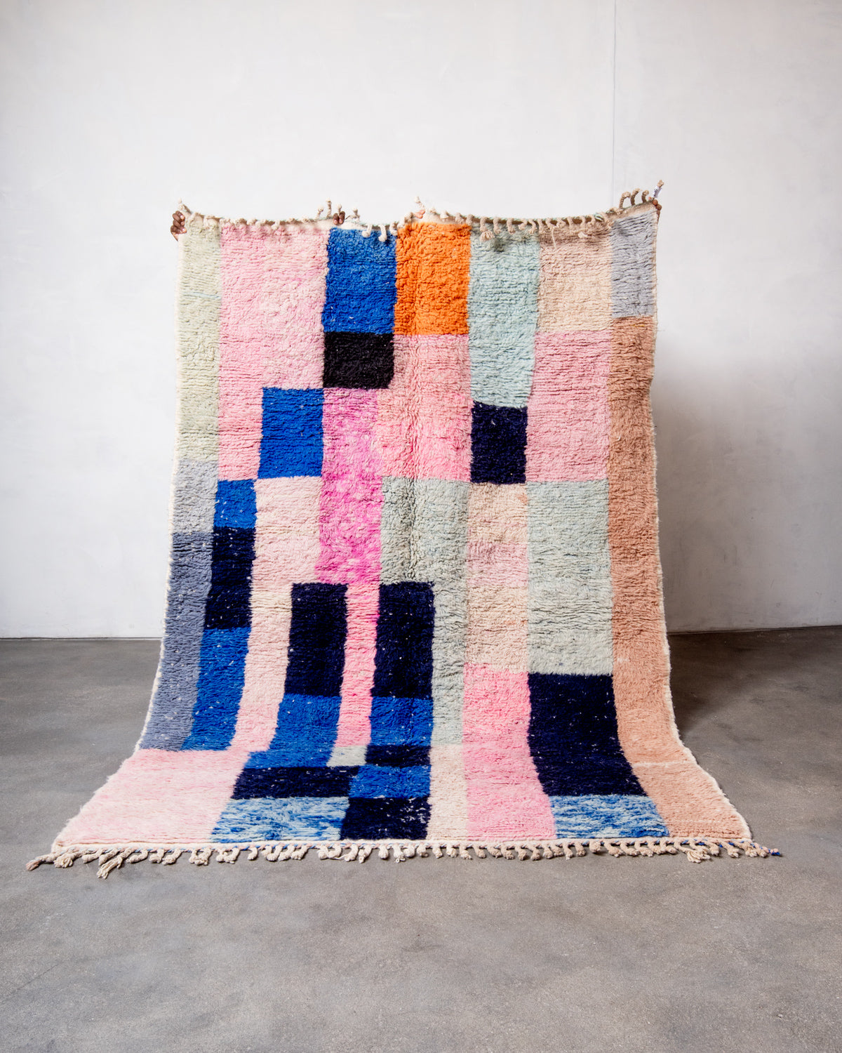 Modern, designer, handcrafted Berber rug from Morocco. Beniourain carpet with beautiful colours and patterns and fluffy wool texture.